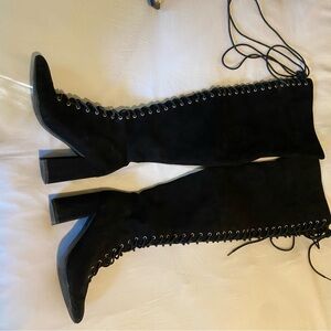 Thigh high lace up boots